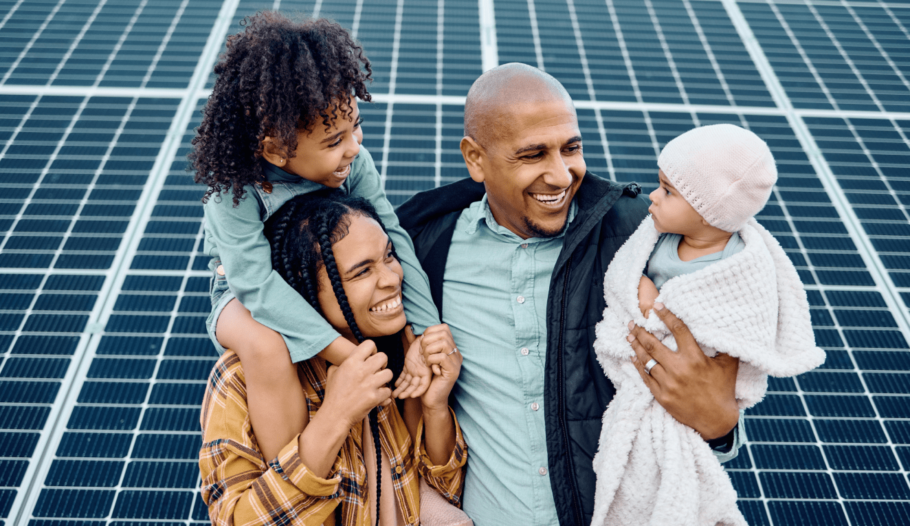 https://sibsongardencommunity.co.uk/wp-content/uploads/2023/11/family-smiling-solar-panels.png